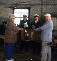 George Wyllie (right) and his wife Daphne (left) in a scene from Murray Grigor’s Whys Man film for Channel 4 (1990).